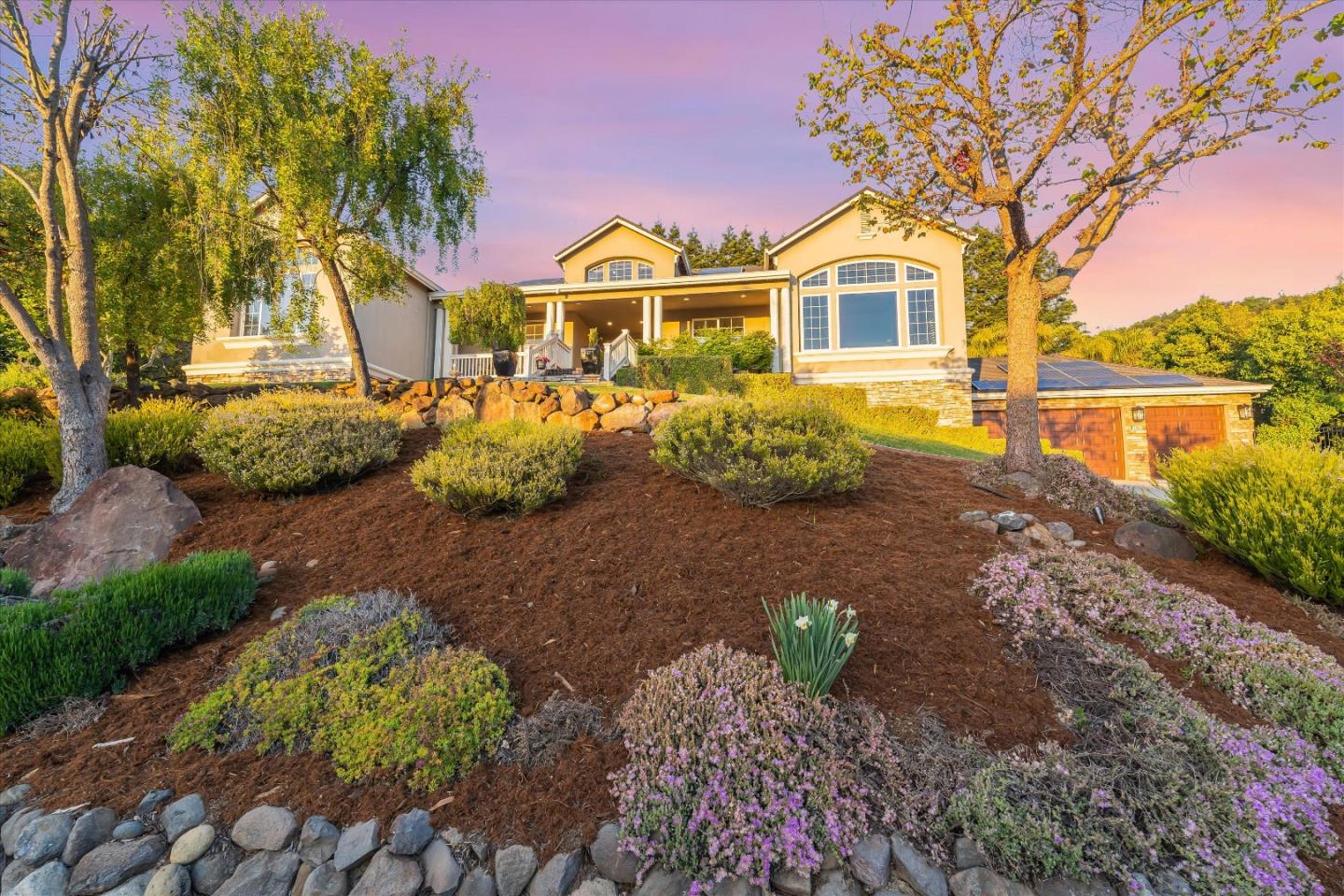 2380 Sunflower Circle Gilroy, CA 95020 - Photo 2 of 43 a front view of a house with a yard