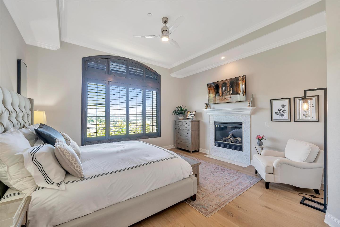 2380 Sunflower Circle Gilroy, CA 95020 - Photo 23 of 43 a bedroom with a bed couches and a fireplace