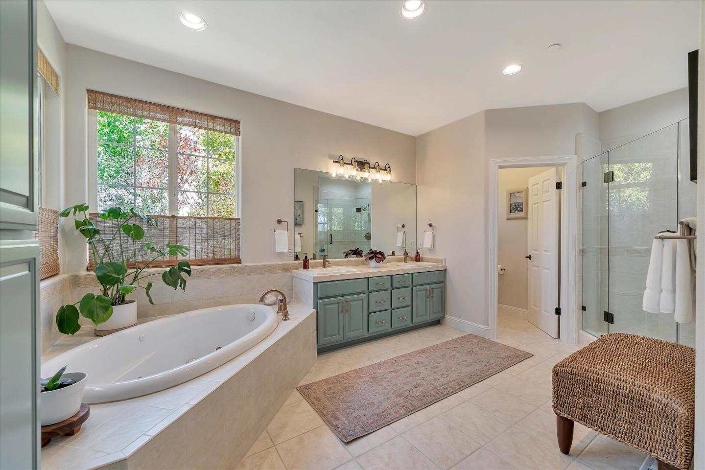 2380 Sunflower Circle Gilroy, CA 95020 - Photo 26 of 43 a spacious bathroom with a granite countertop tub sink and mirror