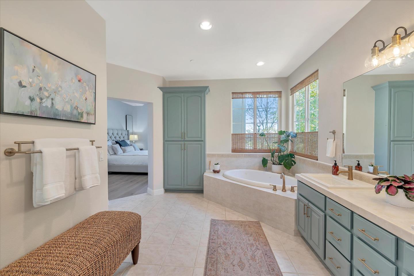 2380 Sunflower Circle Gilroy, CA 95020 - Photo 28 of 43 a spacious bathroom with a tub double vanity and window