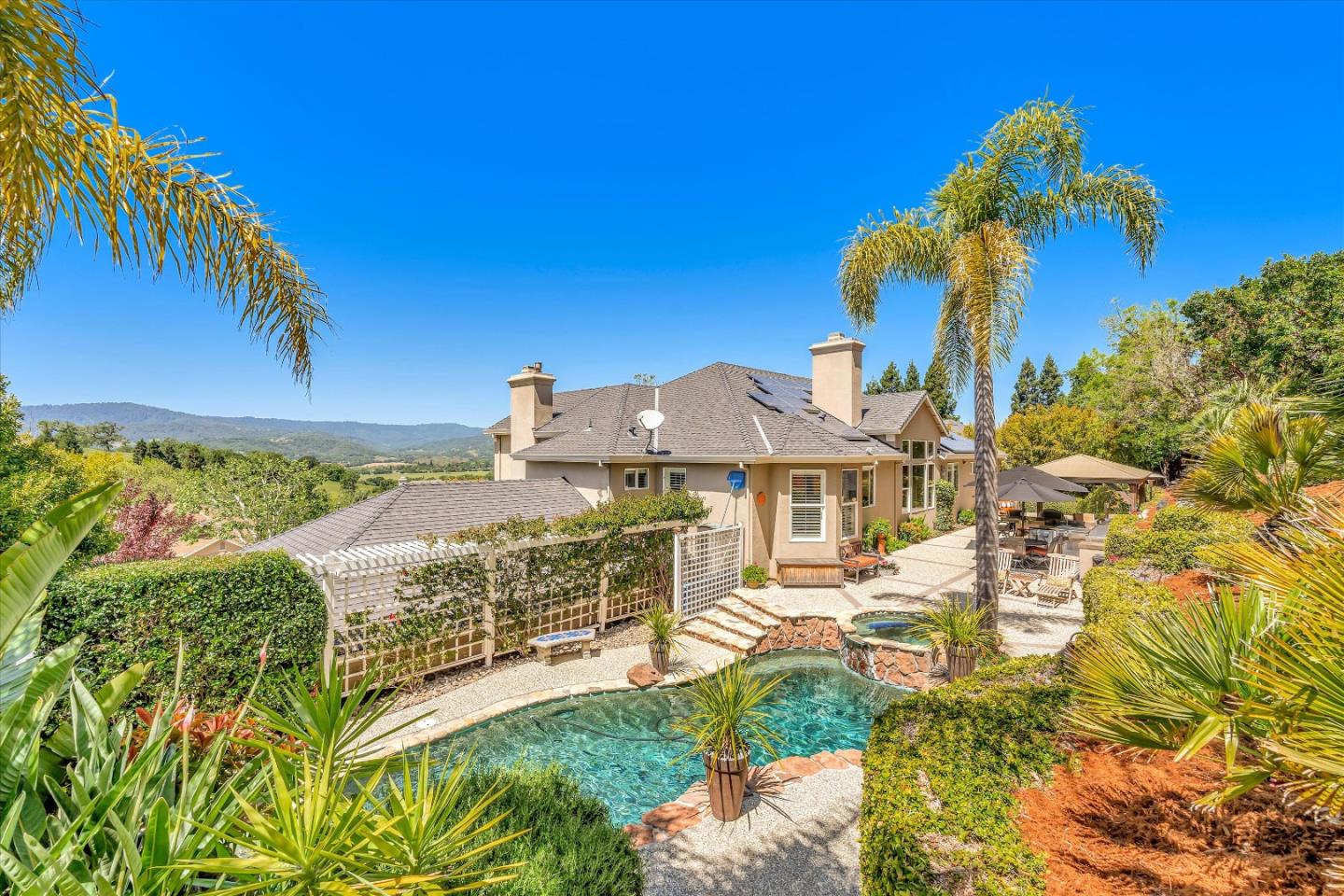 2380 Sunflower Circle Gilroy, CA 95020 - Photo 33 of 43 a view of a house with a yard and potted plants