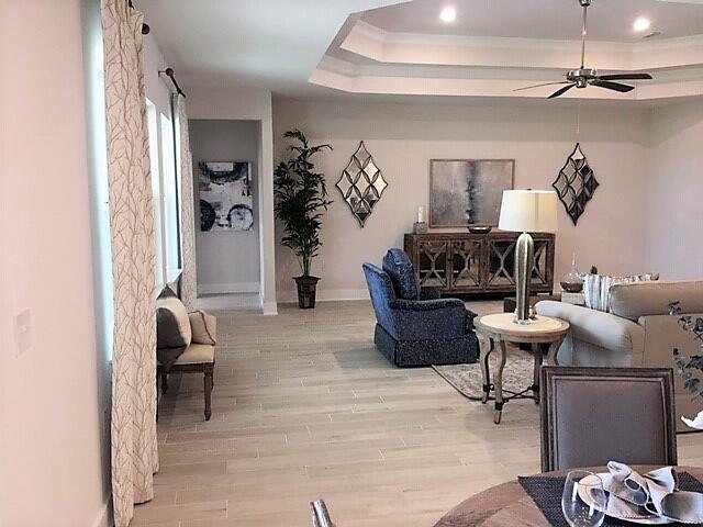 2412 Dakota Way Crestview, FL 32536 - Photo 10 of 30 a living room with furniture and a mirror