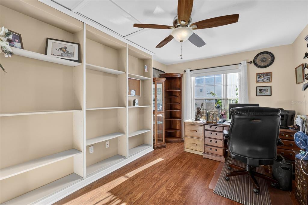 12193 Southeast 175th Loop Summerfield, FL 34491 - Photo 25 of 34 a view of a workspace with furniture and a window
