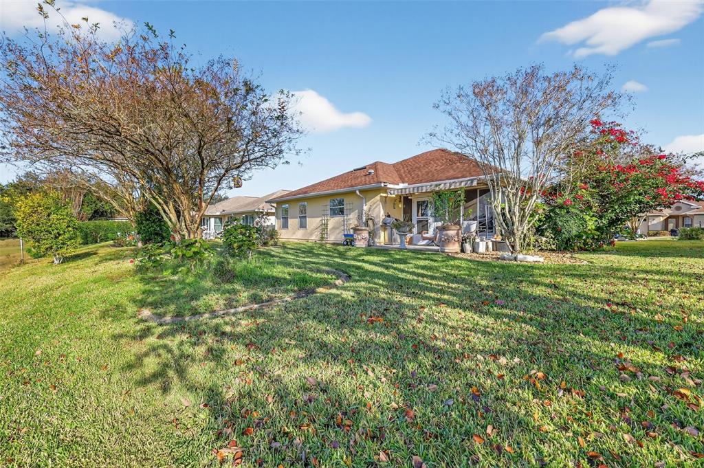 12193 Southeast 175th Loop Summerfield, FL 34491 - Photo 33 of 34 a view of a house with a yard