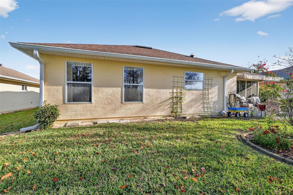 12193 Southeast 175th Loop Summerfield, FL 34491 - Photo 34 of 34 a view of a house with backyard
