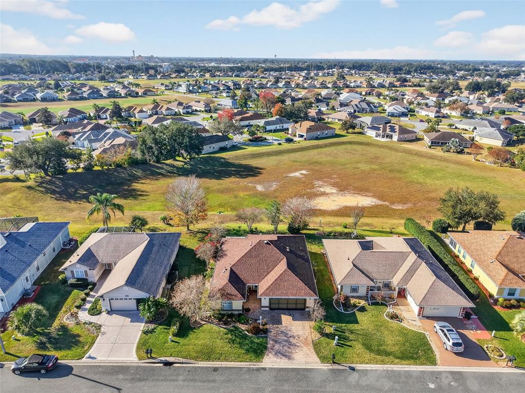 12193 Southeast 175th Loop Summerfield, FL 34491 - Photo 4 of 34 an aerial view of residential houses with outdoor space and ocean view