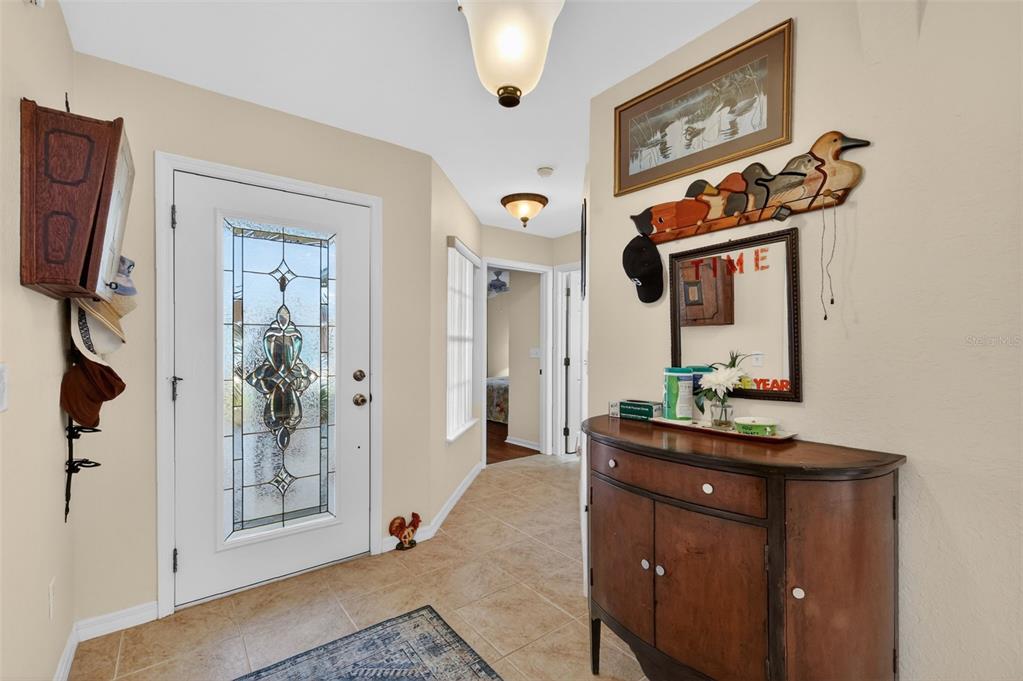 12193 Southeast 175th Loop Summerfield, FL 34491 - Photo 7 of 34 a bathroom with a sink a mirror and a shower