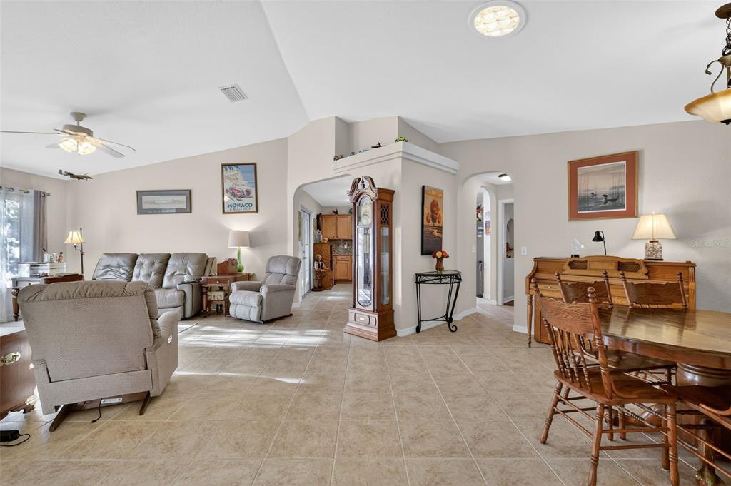 12193 Southeast 175th Loop Summerfield, FL 34491 - Photo 8 of 34 a living room with furniture and a flat screen tv