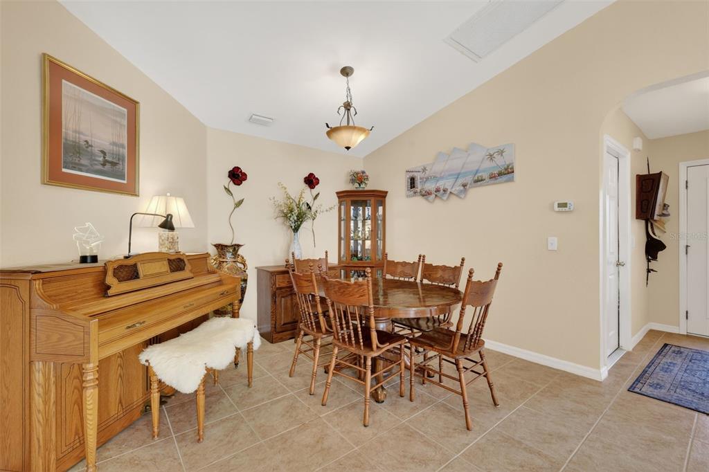 12193 Southeast 175th Loop Summerfield, FL 34491 - Photo 10 of 34 a dining room with furniture and window