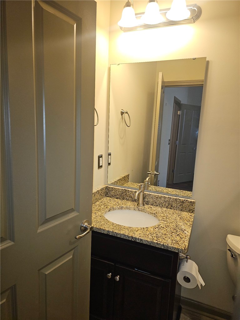 235 Pendleton Road Clemson, SC 29631 - Photo 2 of 21 This bathroom features a contemporary vanity with a granite countertop and a sleek sink.