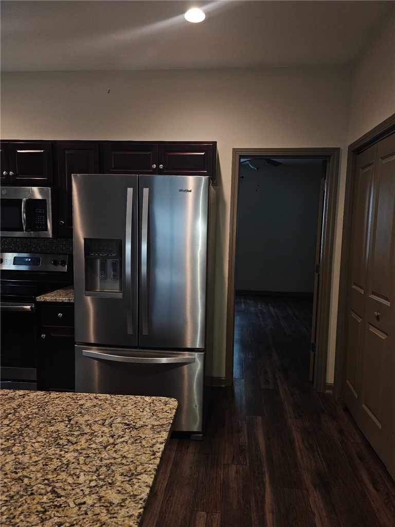235 Pendleton Road Clemson, SC 29631 - Photo 8 of 21 This functional kitchen features rich cabinetry, gleaming countertops, and modern appliances, creating an inviting culinary space.