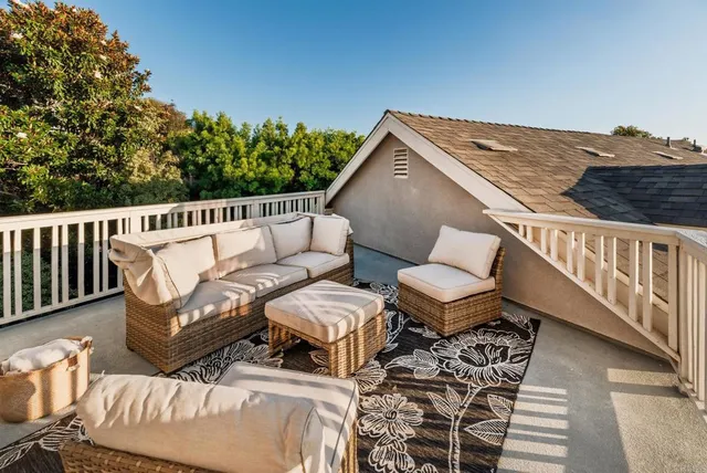 a roof of a house with outdoor seating