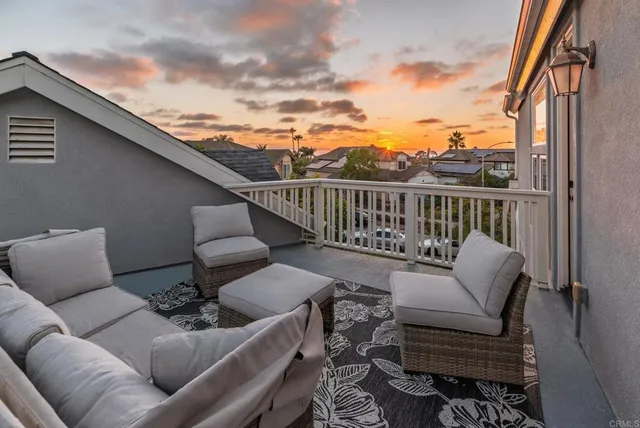 a balcony with furniture