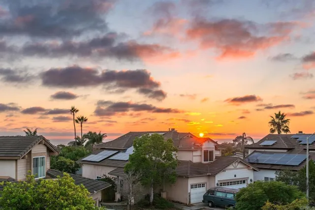a view of a city with a house