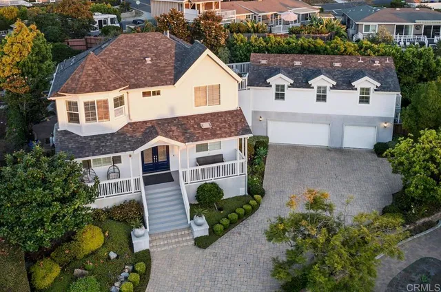 an aerial view of a house with garden