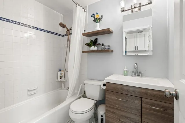 a view of livingroom with furniture and white walls
