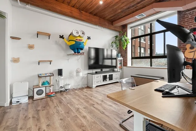 a kitchen with stainless steel appliances a sink and a stove