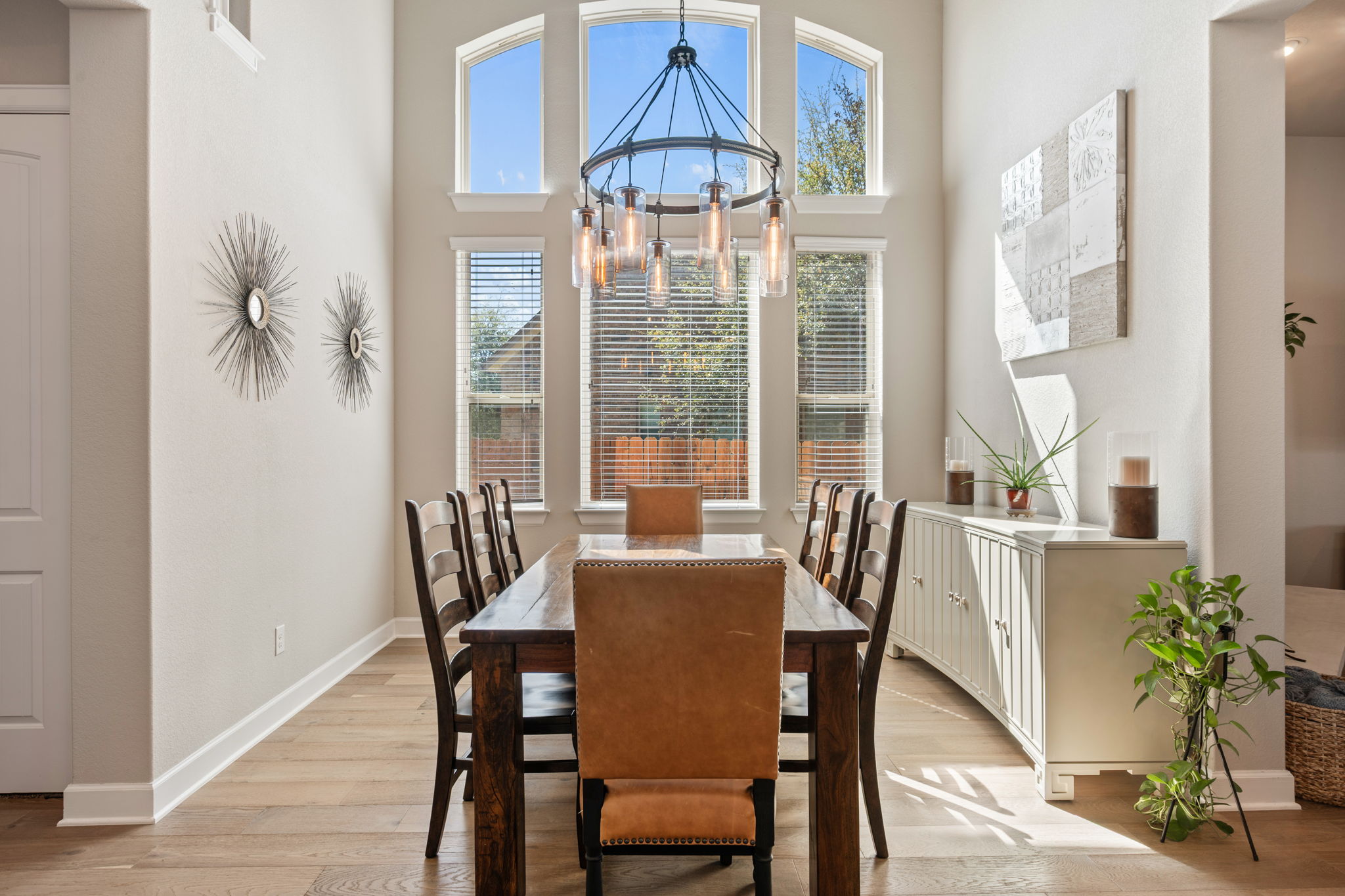 4118 Capora Way Round Rock, TX 78681 - Photo 12 of 39 a view of a dining room with furniture window and wooden floor