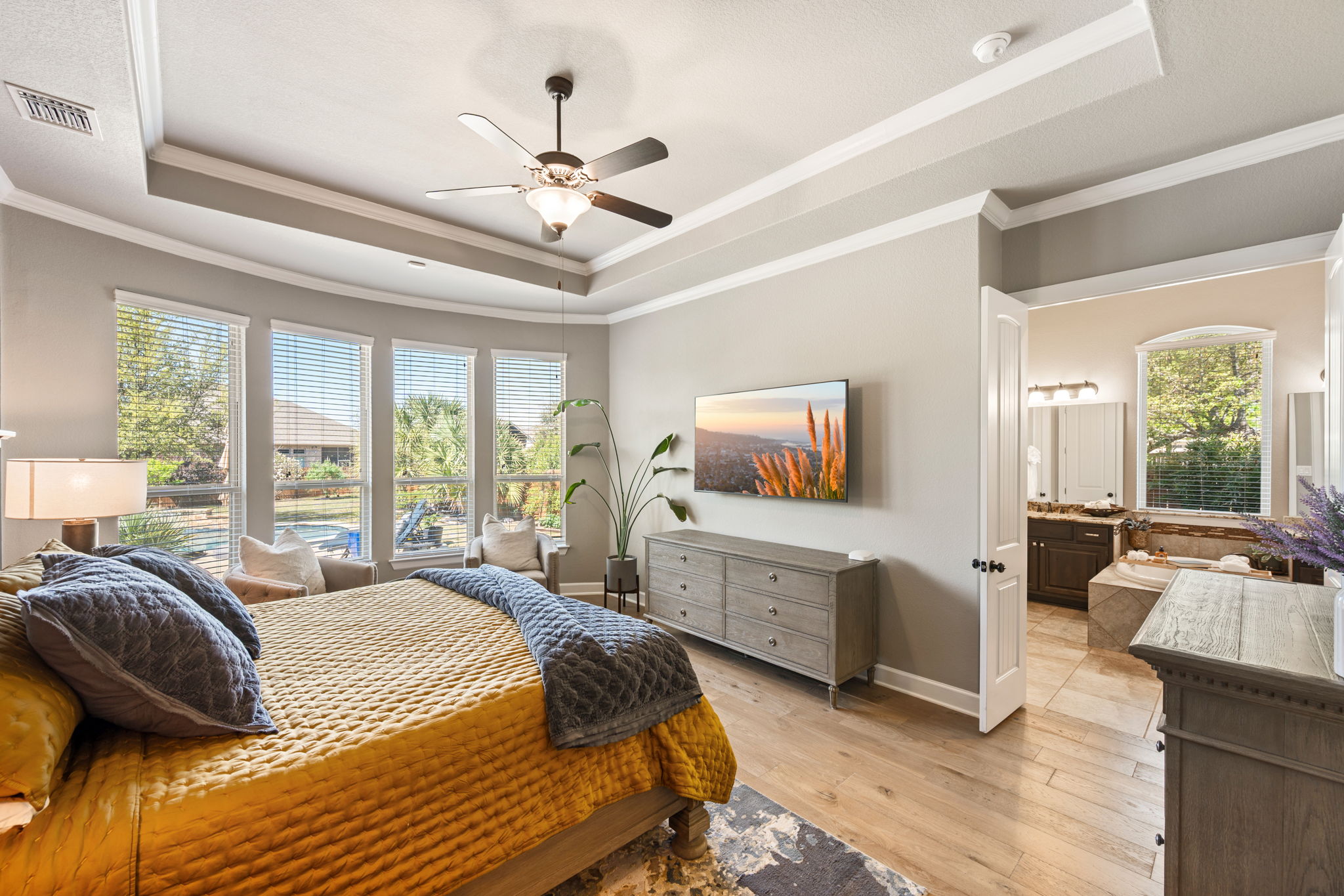 4118 Capora Way Round Rock, TX 78681 - Photo 13 of 39 a bedroom with a bed and a large window