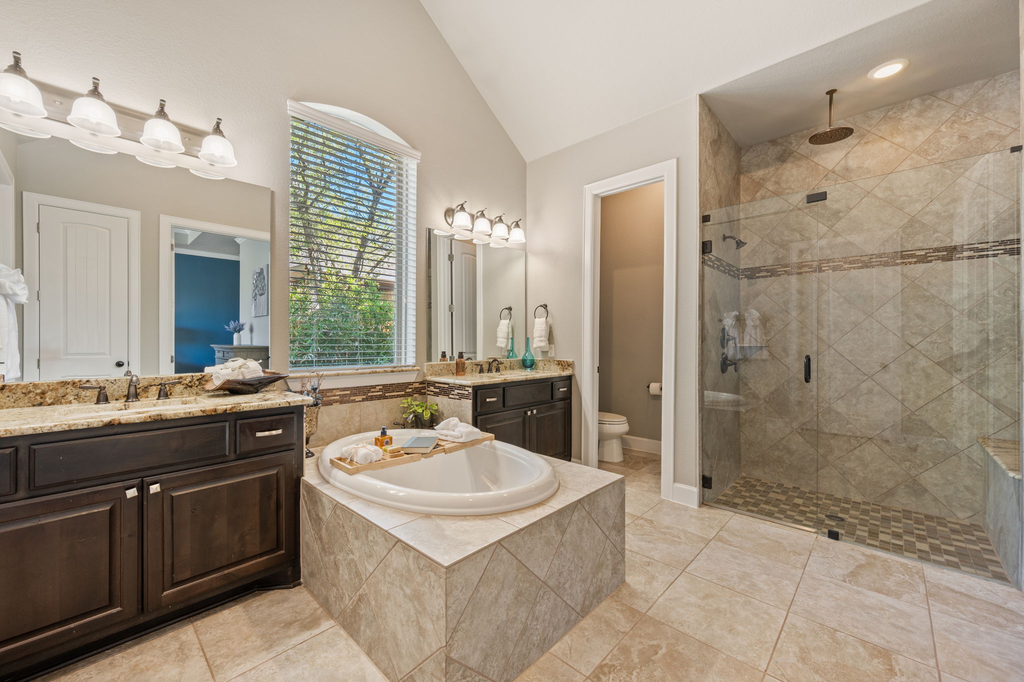 4118 Capora Way Round Rock, TX 78681 - Photo 15 of 39 a bathroom with a sink double vanity and a mirror