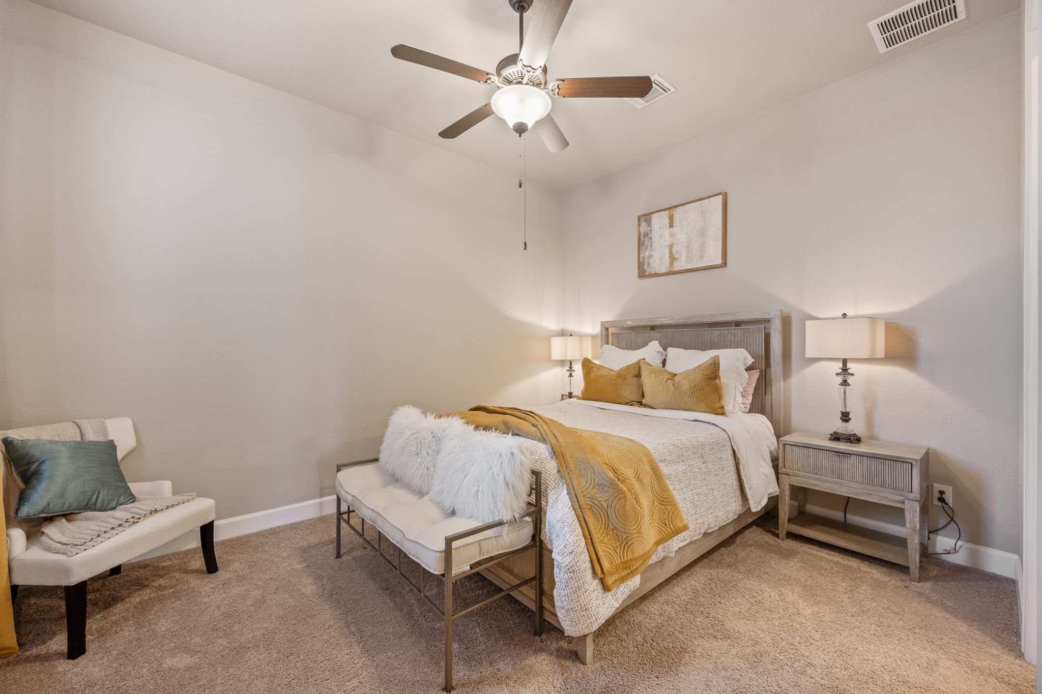 4118 Capora Way Round Rock, TX 78681 - Photo 16 of 39 a bedroom with a bed and a chandelier