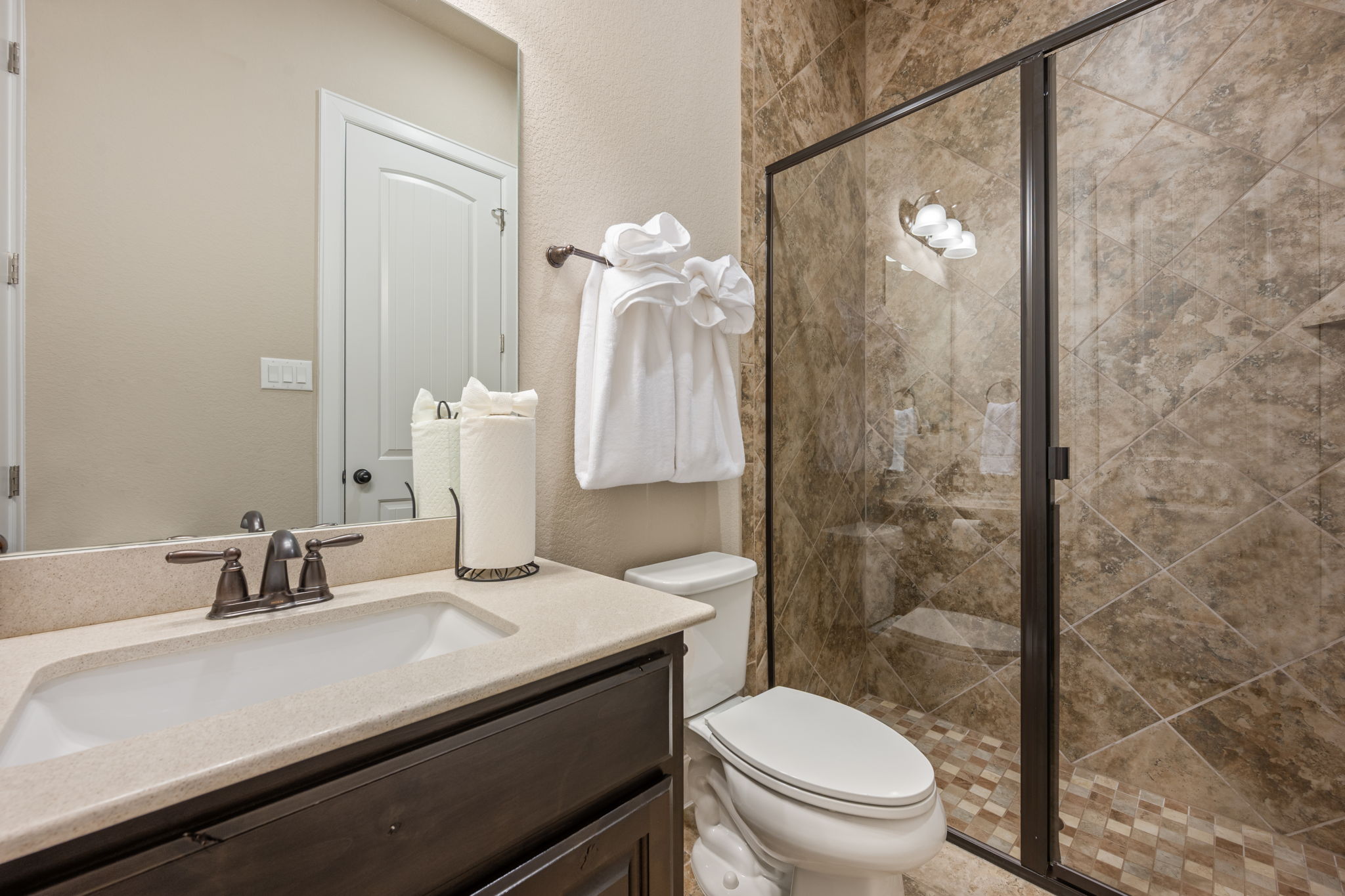 4118 Capora Way Round Rock, TX 78681 - Photo 17 of 39 a bathroom with a sink a toilet and shower