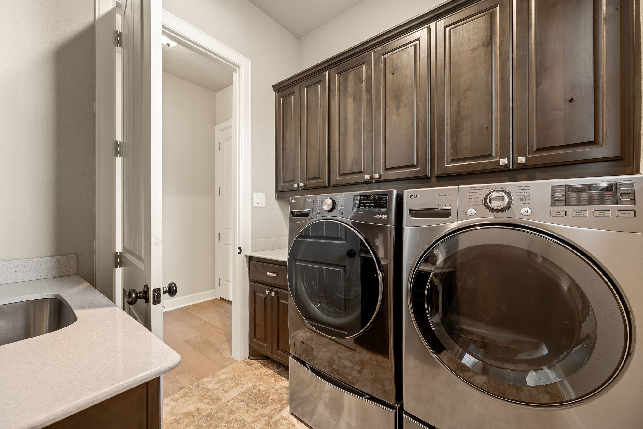 4118 Capora Way Round Rock, TX 78681 - Photo 18 of 39 a utility room with dryer and washer