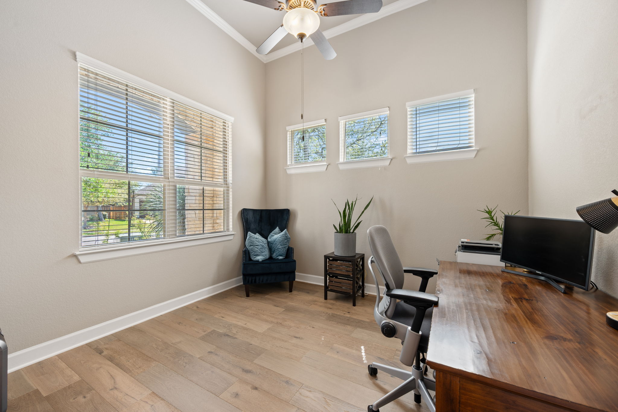 4118 Capora Way Round Rock, TX 78681 - Photo 20 of 39 a view of a workspace with furniture and a window