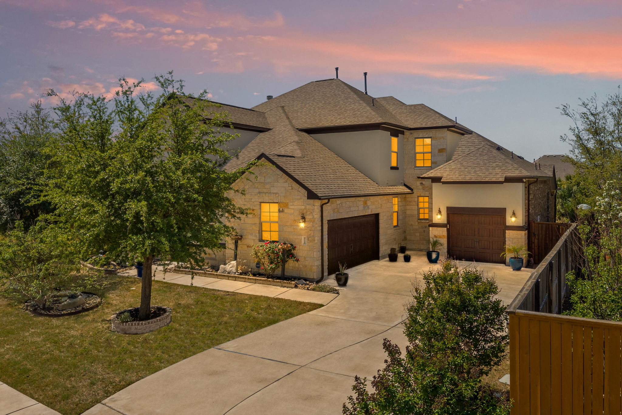 4118 Capora Way Round Rock, TX 78681 - Photo 2 of 39 a front view of a house with yard