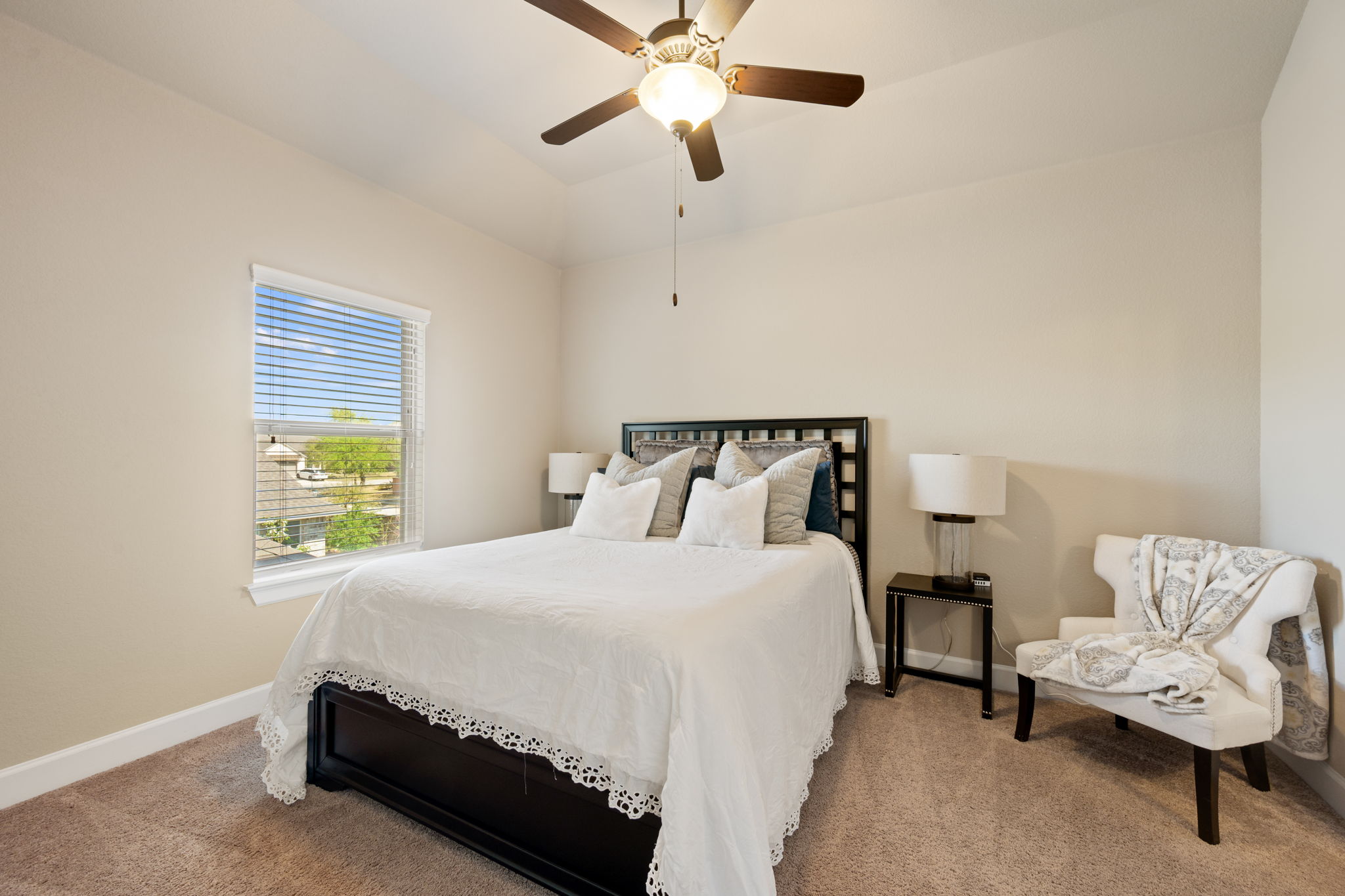 4118 Capora Way Round Rock, TX 78681 - Photo 23 of 39 a bedroom with a bed and window