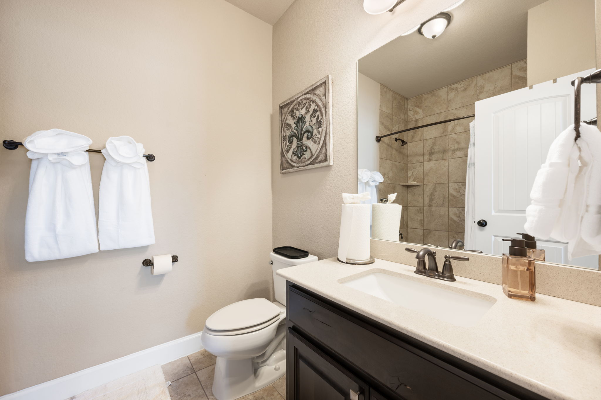 4118 Capora Way Round Rock, TX 78681 - Photo 24 of 39 a bathroom with a granite countertop sink a toilet and a mirror