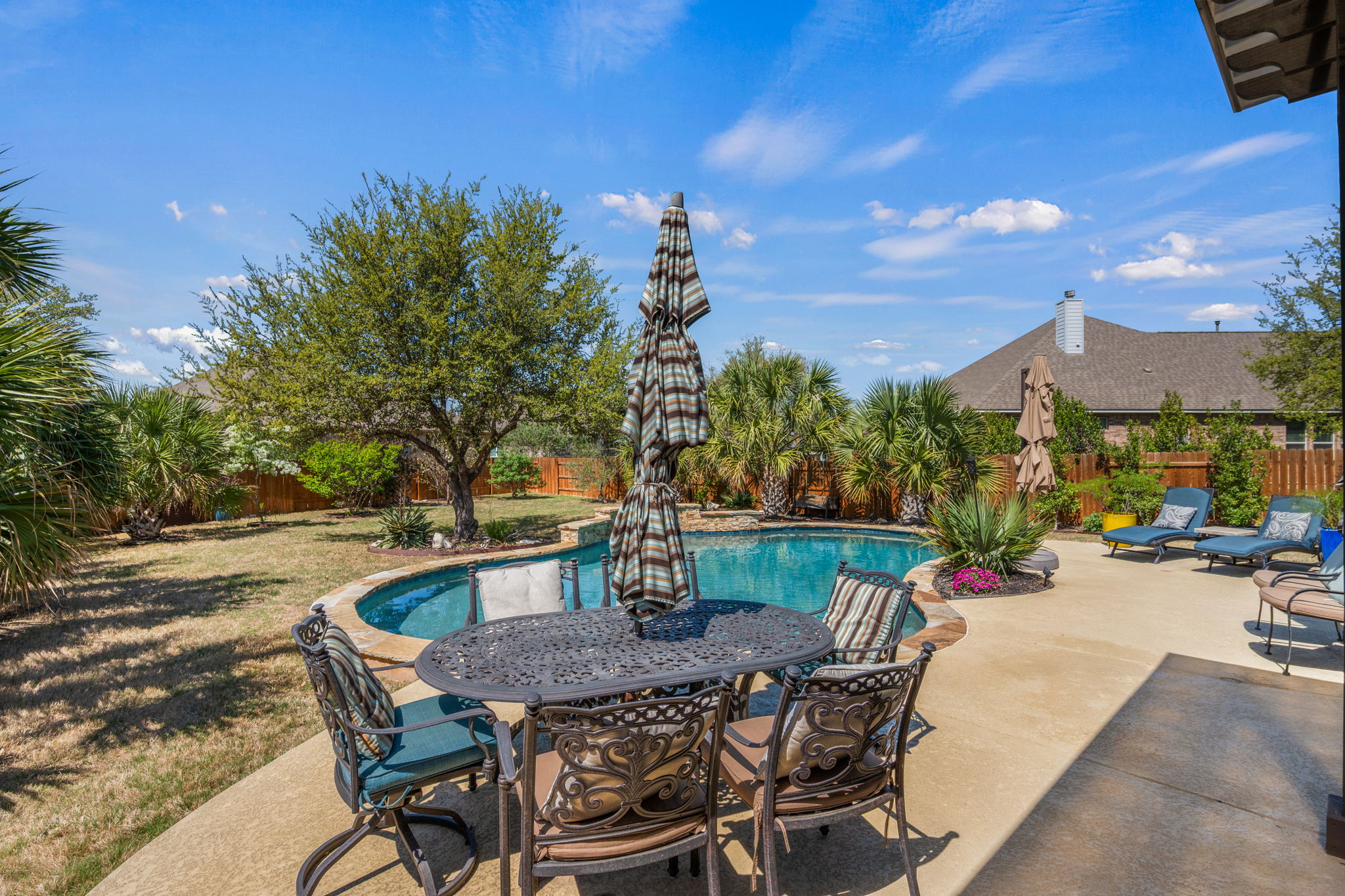 4118 Capora Way Round Rock, TX 78681 - Photo 35 of 39 a view of a patio with a table and chairs