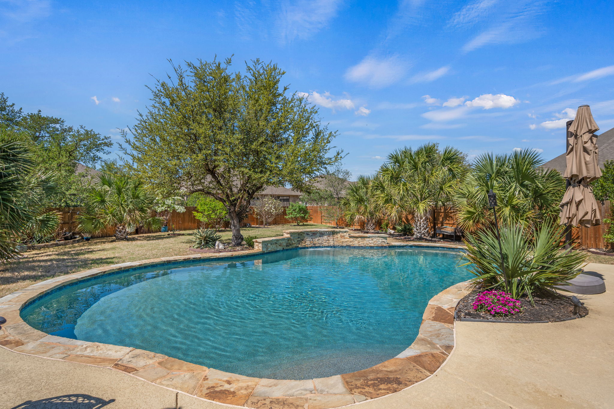 4118 Capora Way Round Rock, TX 78681 - Photo 39 of 39 a view of a swimming pool with a yard