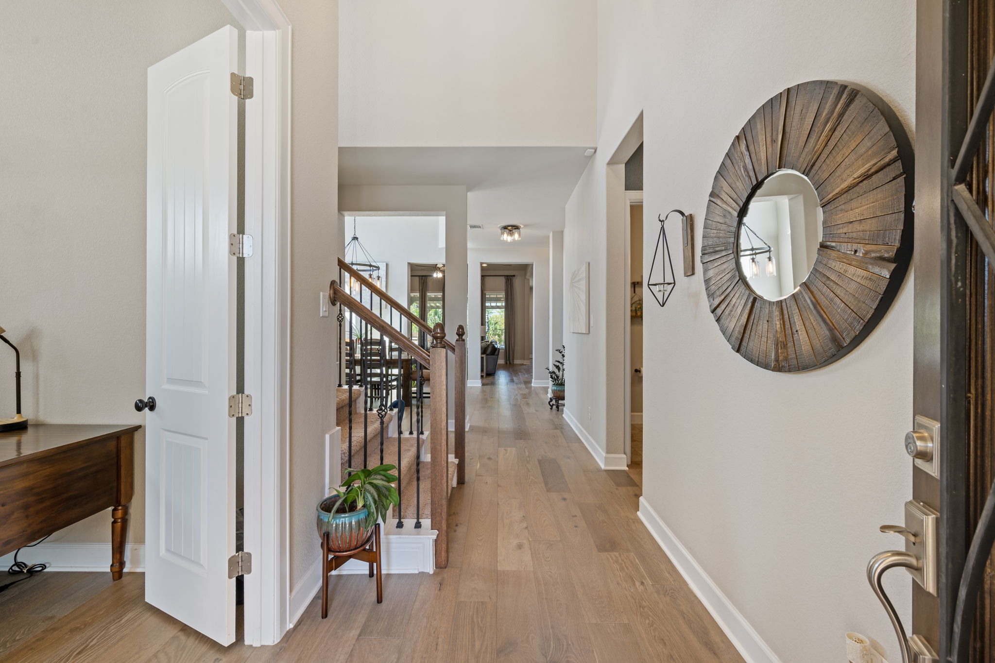 4118 Capora Way Round Rock, TX 78681 - Photo 4 of 39 a view of a hallway with wooden floor and entryway