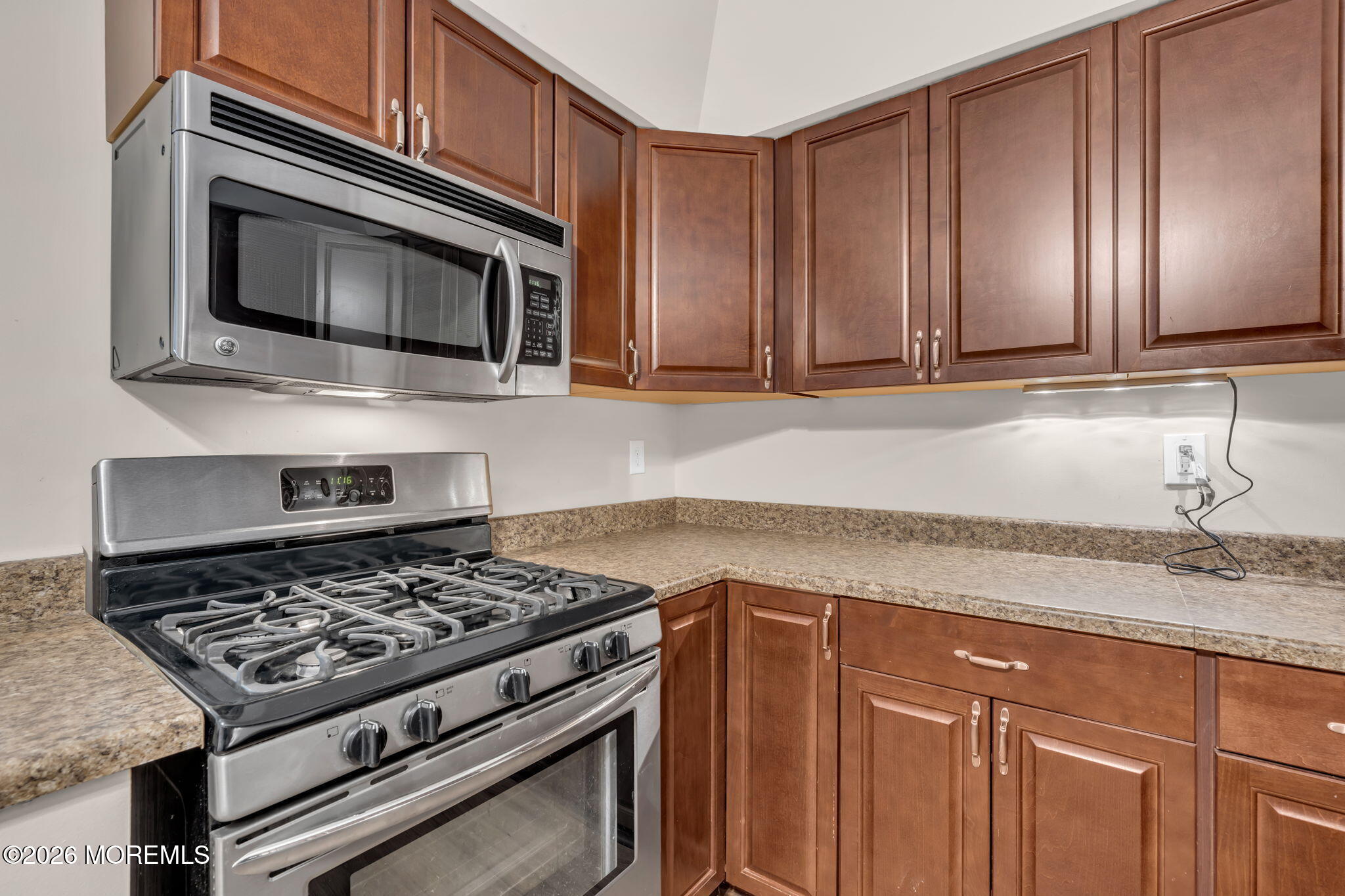 72 Kingsley Way Freehold, NJ 07728 - Photo 15 of 36 a kitchen with granite countertop stainless steel appliances and cabinets