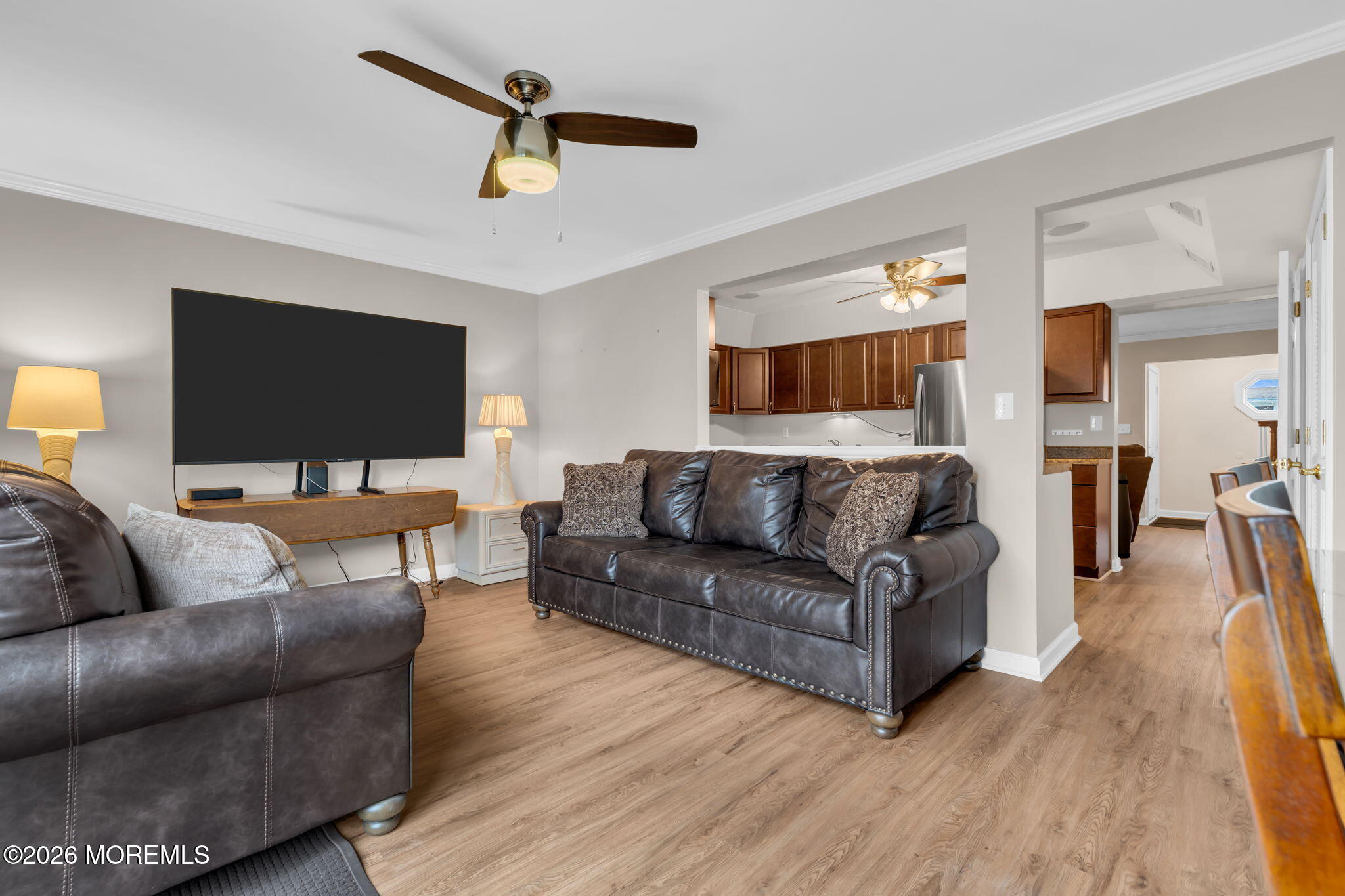 72 Kingsley Way Freehold, NJ 07728 - Photo 17 of 36 a living room with furniture and a flat screen tv
