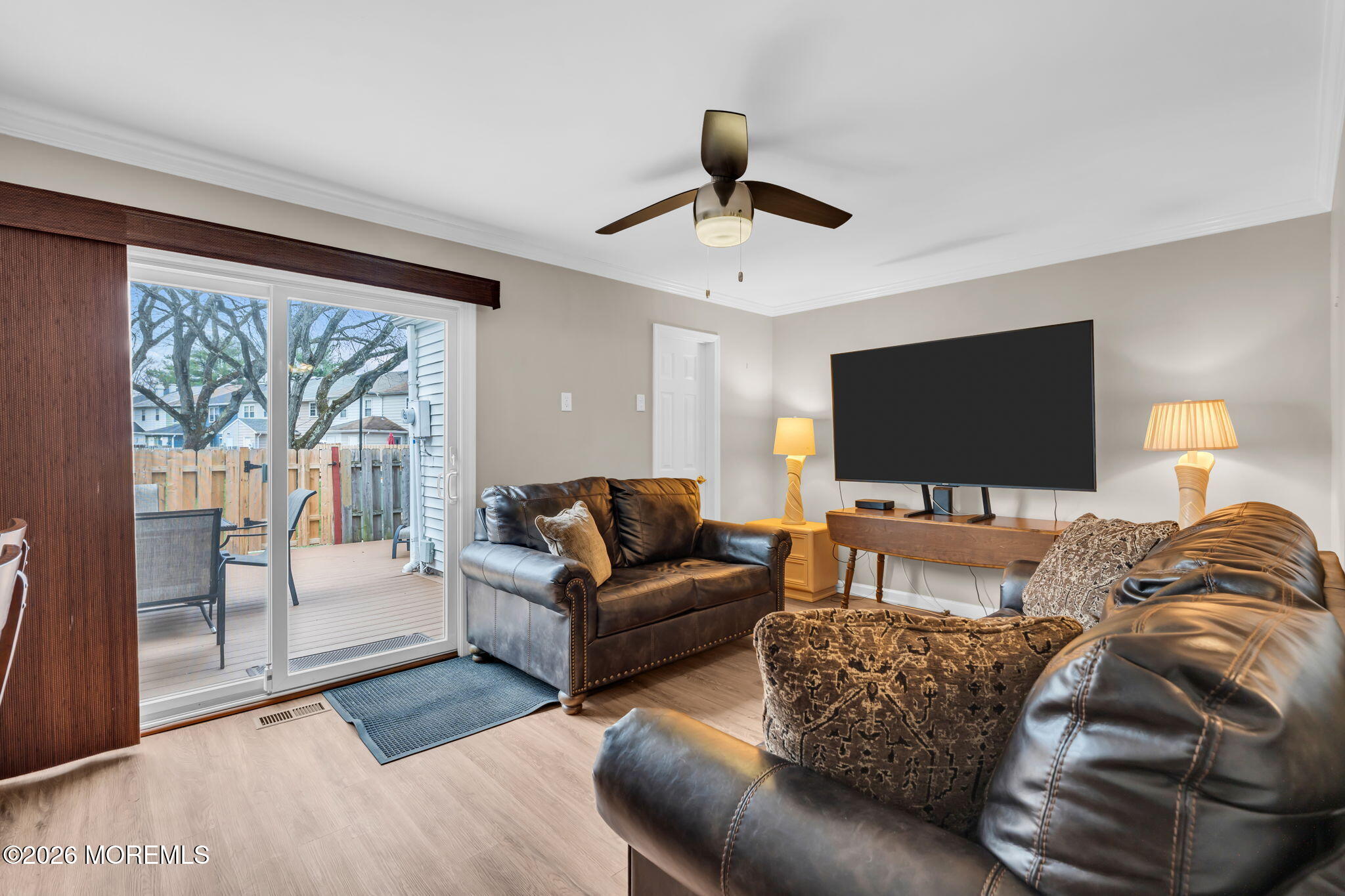 72 Kingsley Way Freehold, NJ 07728 - Photo 18 of 36 a living room with furniture and a flat screen tv