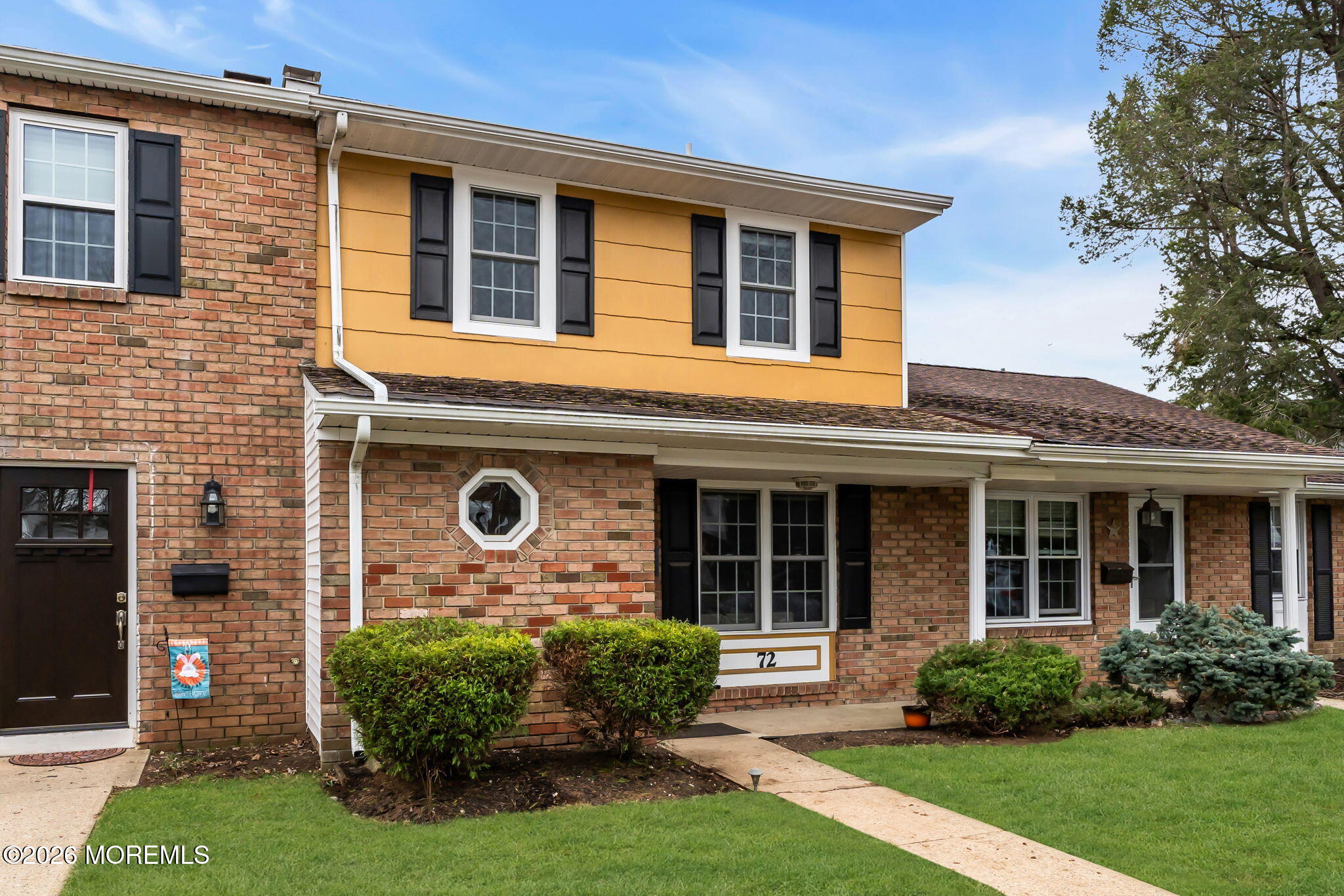 72 Kingsley Way Freehold, NJ 07728 - Photo 2 of 36 a front view of a house with garden