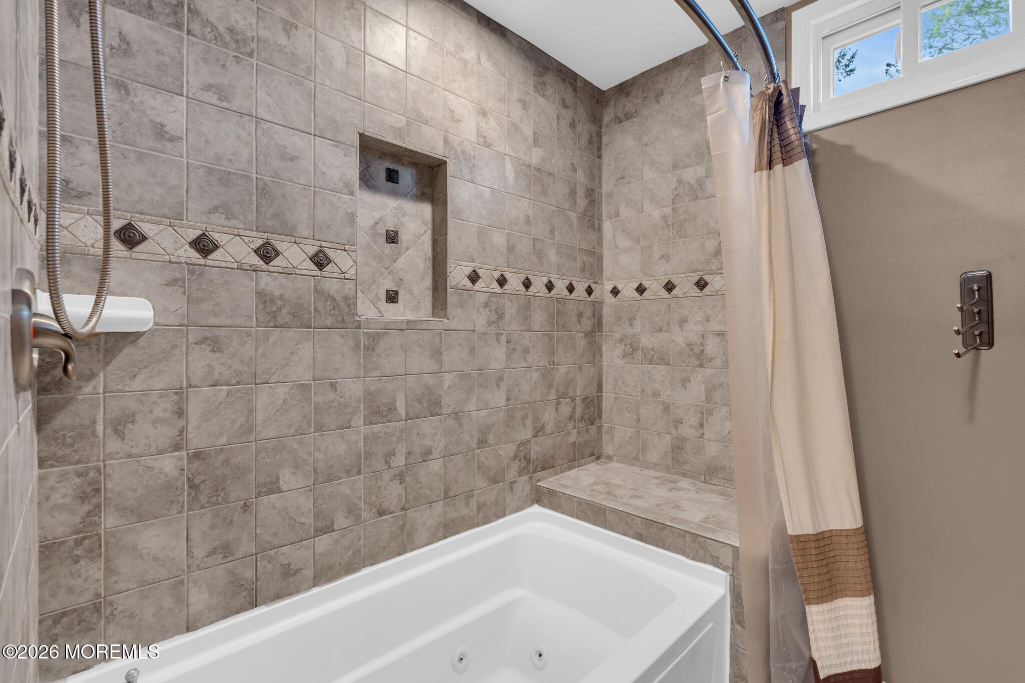 72 Kingsley Way Freehold, NJ 07728 - Photo 23 of 36 a bathroom with a bathtub and shower