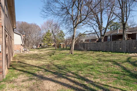 a view of back yard of the house