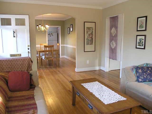 2719 Everett Avenue Raleigh, NC 27607 - Photo 3 of 10 a living room with furniture and wooden floor