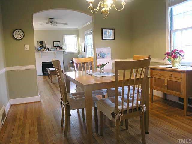 2719 Everett Avenue Raleigh, NC 27607 - Photo 4 of 10 a view of a dining room with furniture and wooden floor