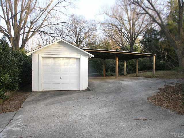2719 Everett Avenue Raleigh, NC 27607 - Photo 10 of 10 a front view of a house with a yard and garage