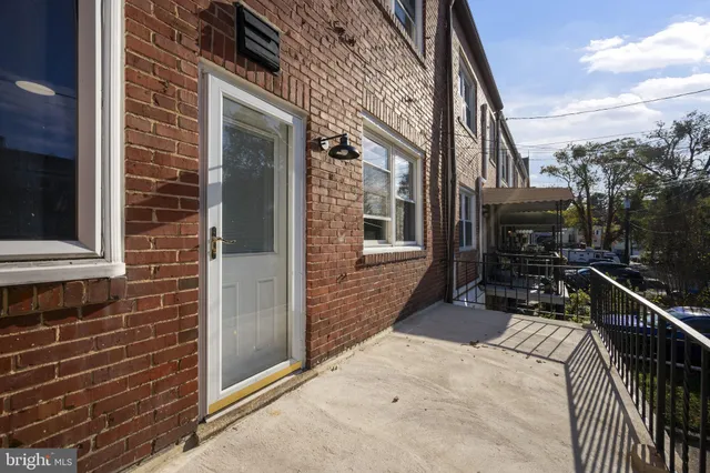 a view of a house with backyard of the house