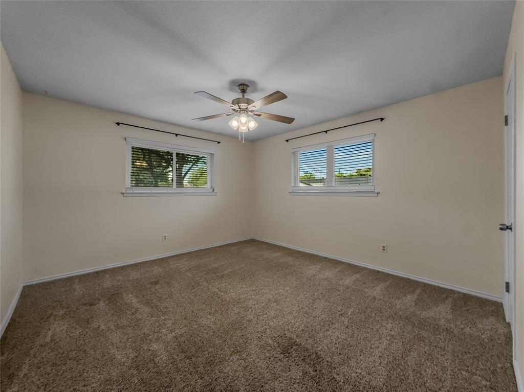 220 Cooper Drive Hurst, TX 76053 - Photo 20 of 27 a view of an empty room with a window