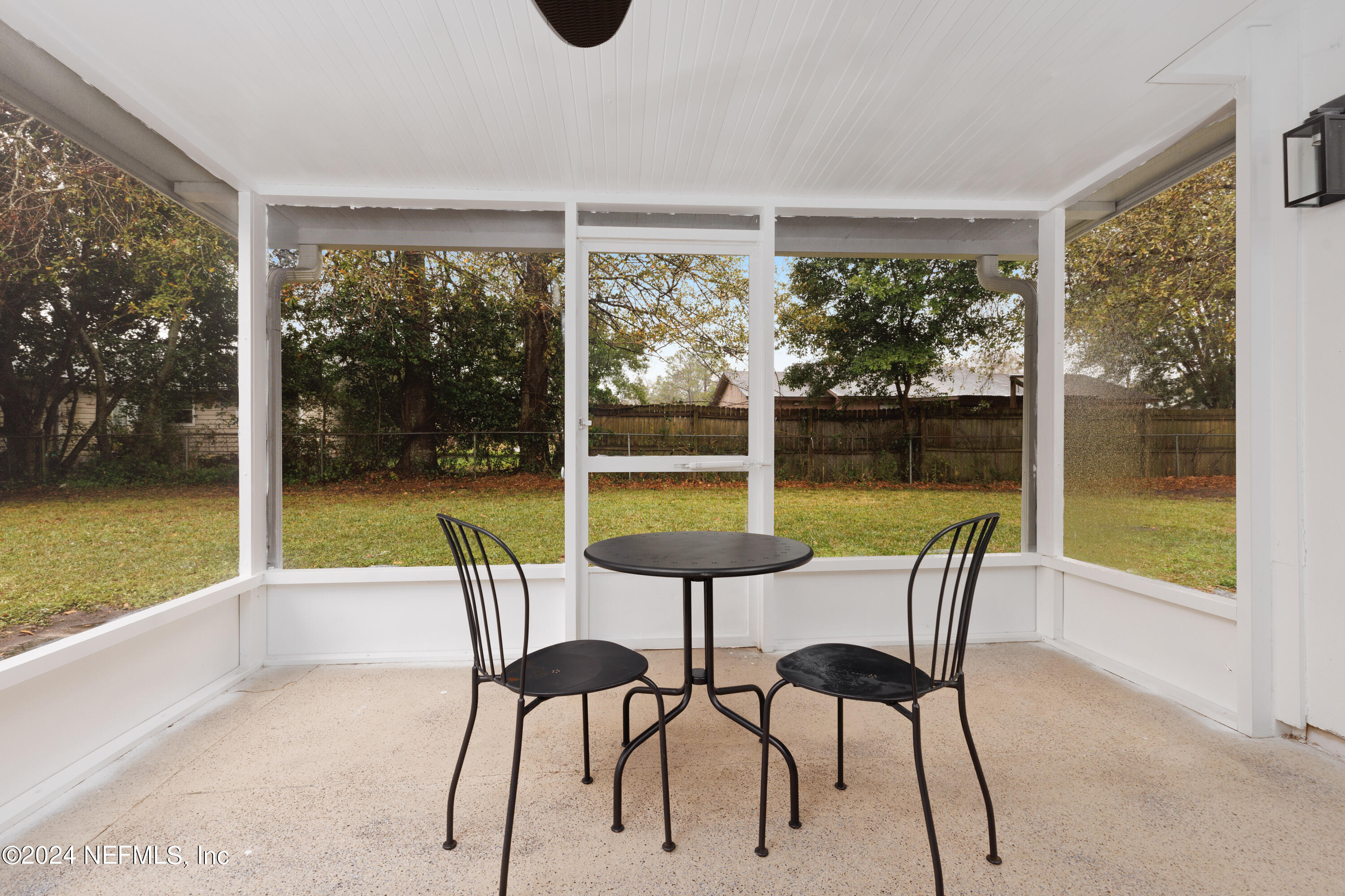 8225 Cassie Road Jacksonville, FL 32221 - Photo 21 of 22 a view of a dining room with furniture and window