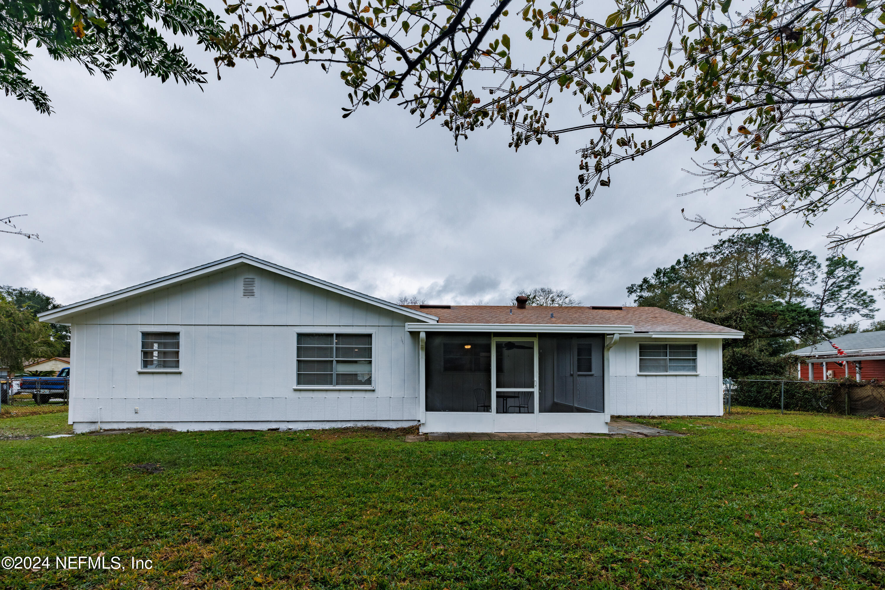 8225 Cassie Road Jacksonville, FL 32221 - Photo 6 of 22 a front view of a house with a garden