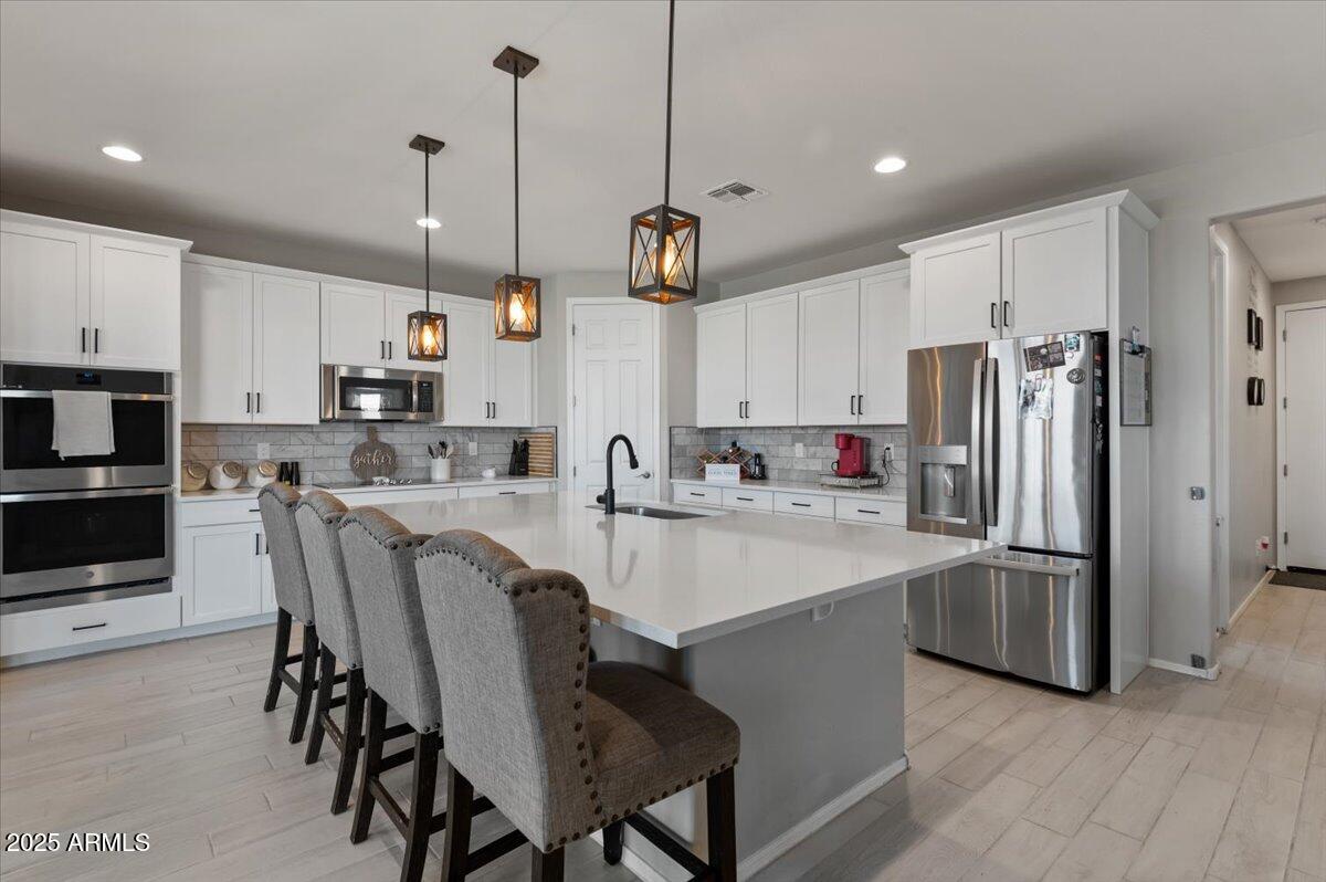 10052 East Hay Loft Road Florence, AZ 85132 - Photo 12 of 44 12-Kitchen