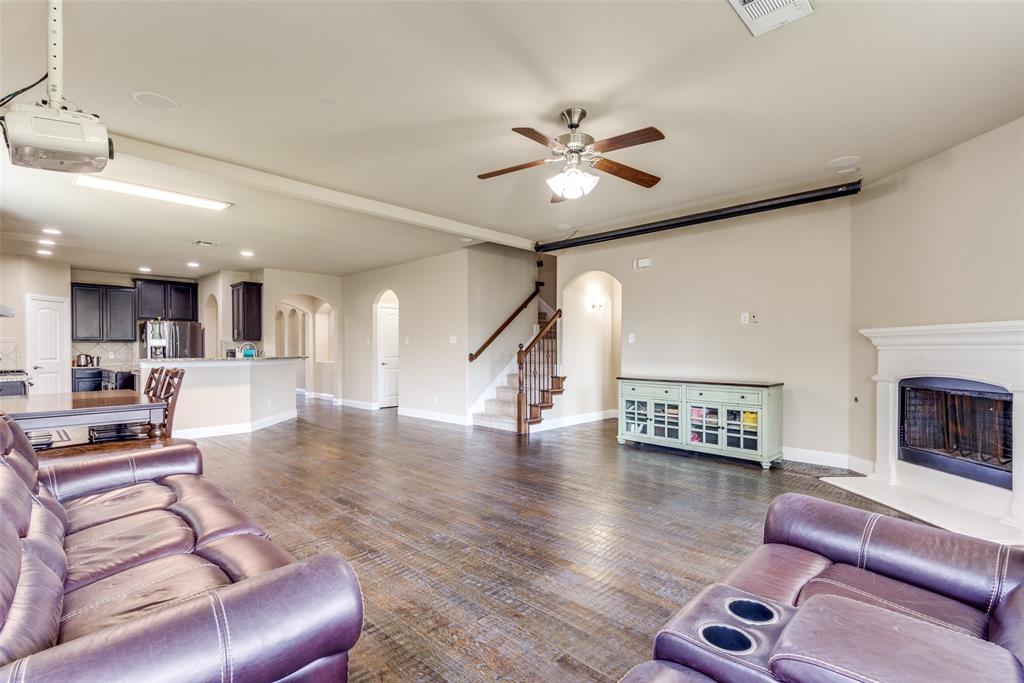 3716 Rumford Road Frisco, TX 75036 - Photo 5 of 25 a living room with furniture and a wooden floor