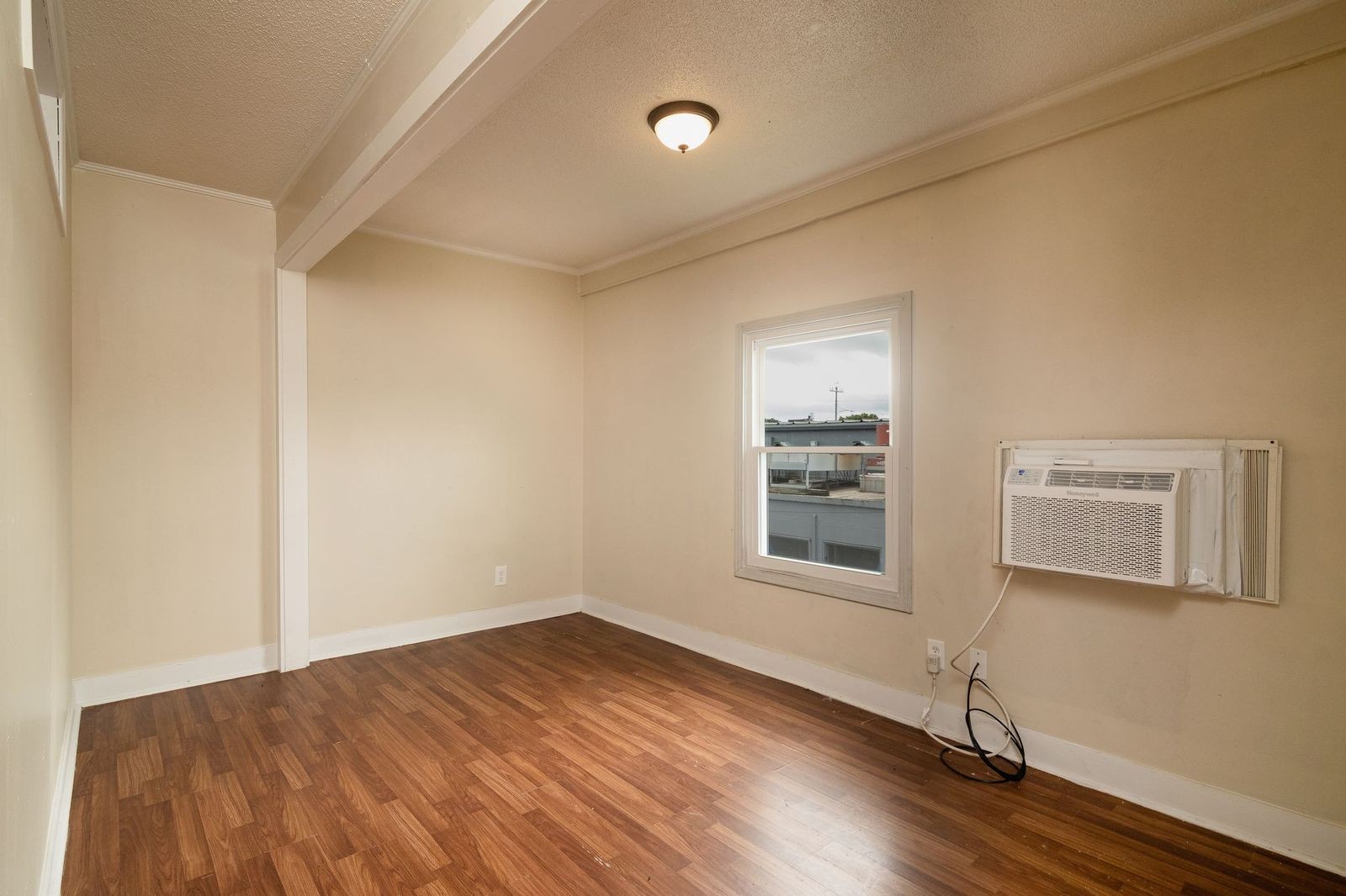 206 Edison Street West Fayetteville, TN 37334 - Photo 7 of 9 a view of a livingroom with wooden floor and a window